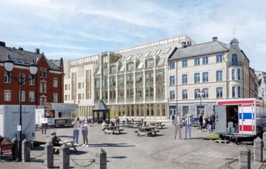 Fra Kiperviktorget. Sørlig fasade – midtre bygg. Stein i grønnfarge. (ill: VerkStad Arkitektur og Plot Arkitekter)